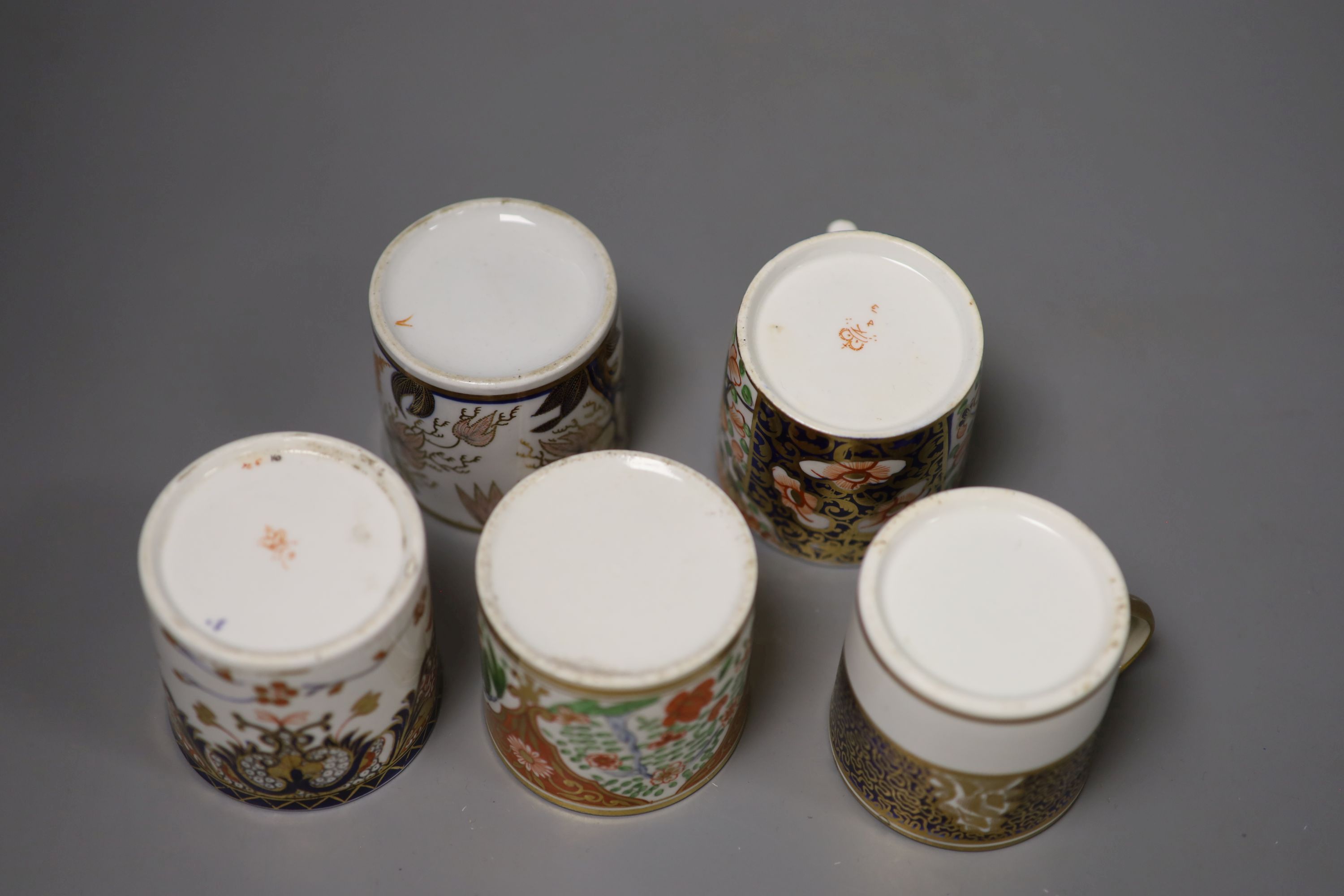 Five English coffee cans,